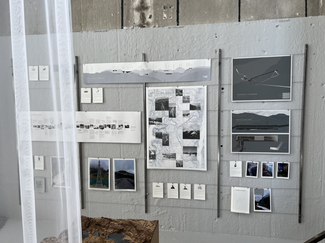 Our research and investigations hanging from our representation of the electrical grid on the walls in the exhibition space